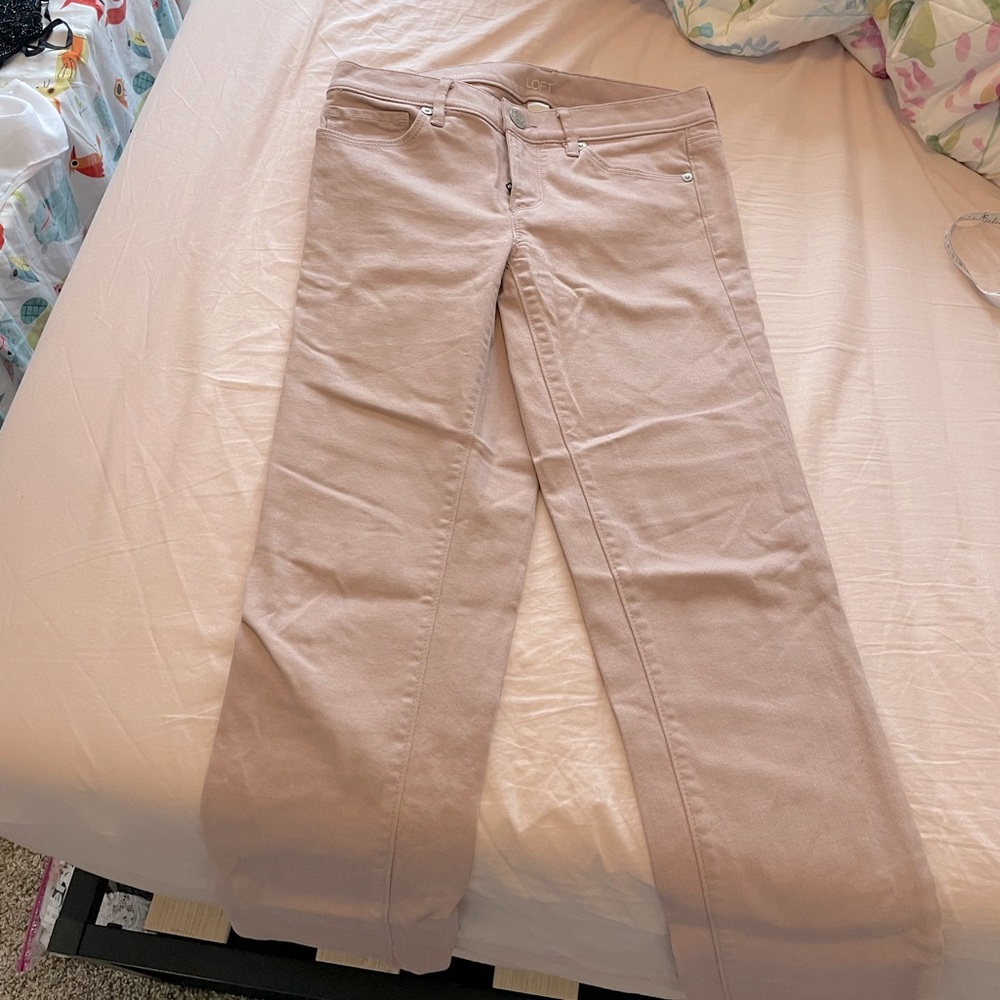Dusty pink skinny jeans